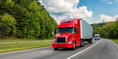 Full Truckload FTL shipping service offered by Uplift Express Ltd with a large truck on a highway